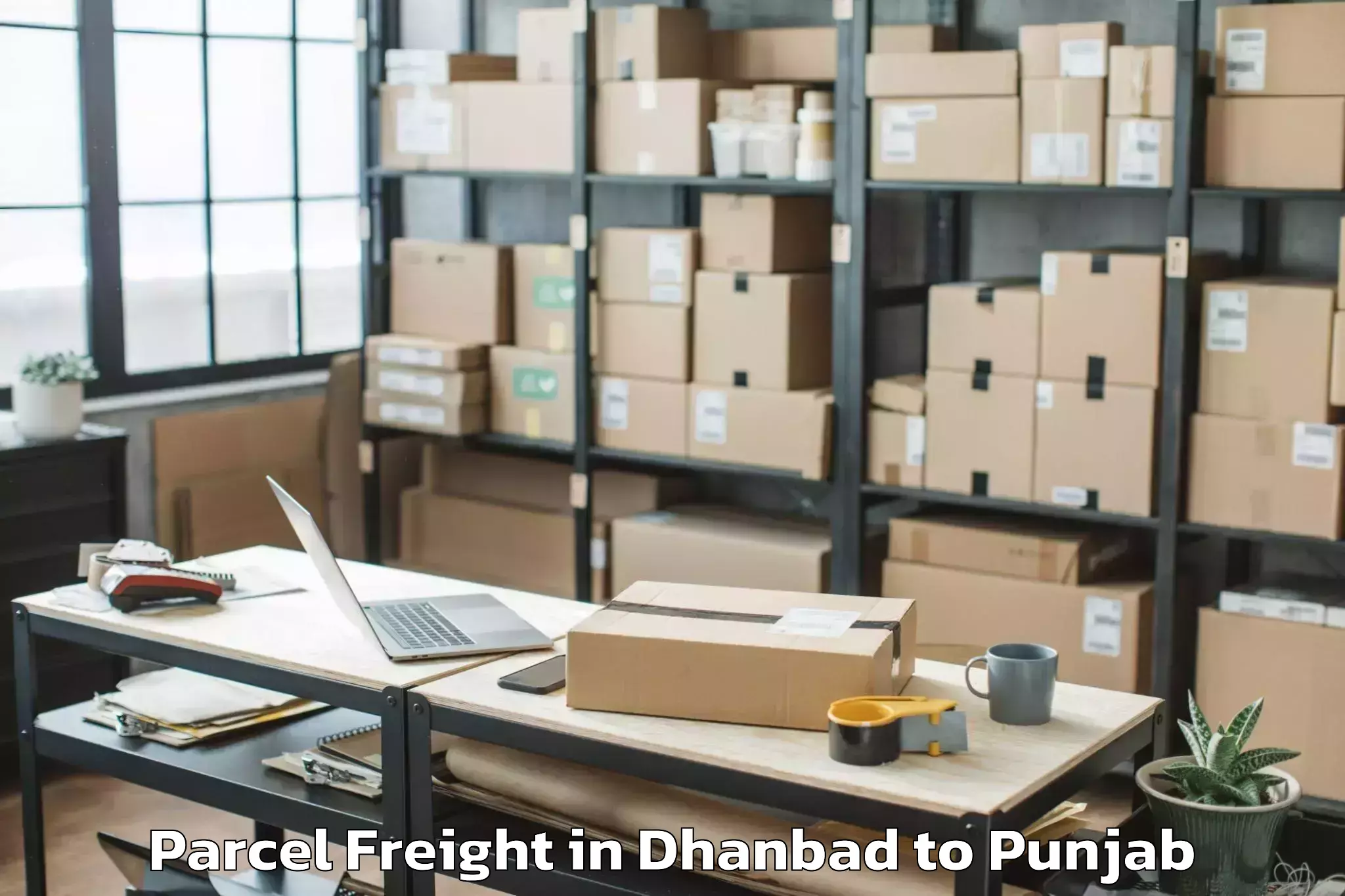 Leading Dhanbad to Garhdiwala Parcel Freight Provider